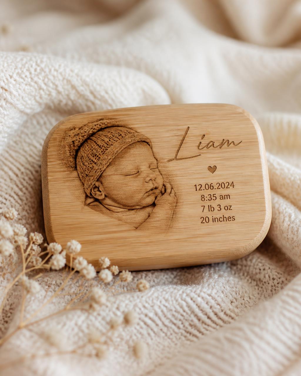 Bamboo keepsake engraved with a newborn photo and birth details